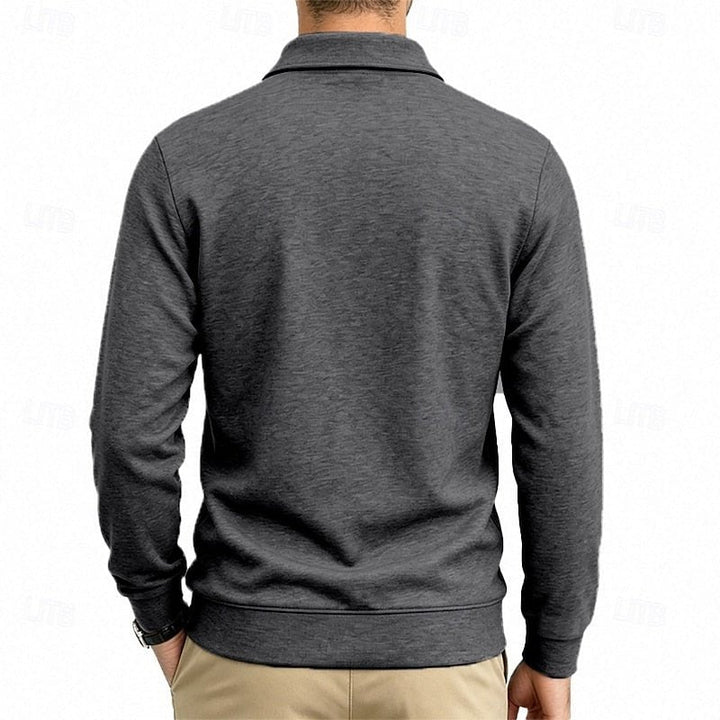 Refined men's long-sleeve polo shirt with a stylish buttoned collar and chest pocket for smart casual.