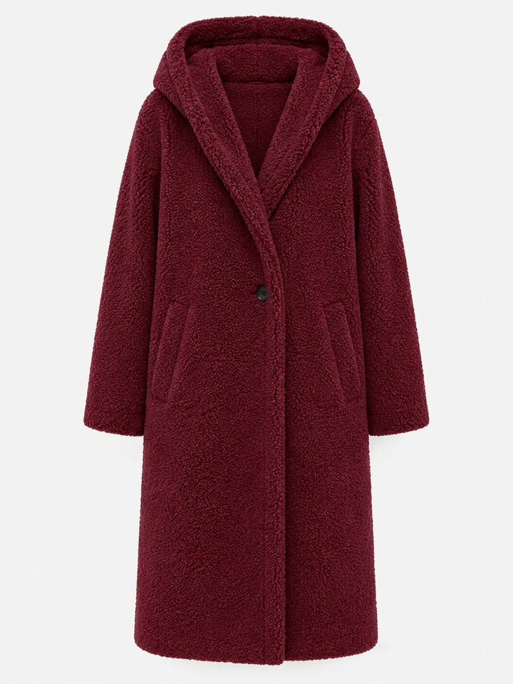 Warm & elegant women's coat, perfect knee-length outerwear for cold weather layering.