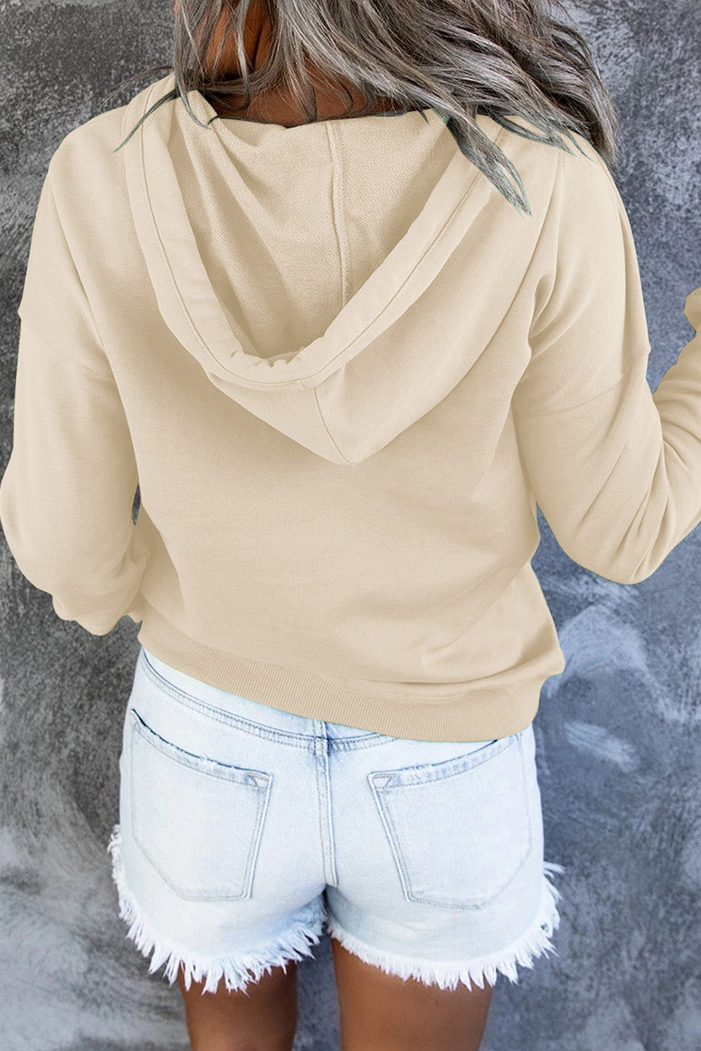 Luxuriously soft women's hooded sweater, ideal for cozy, comfortable everyday wear.