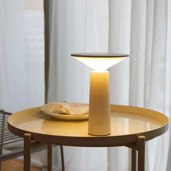 Sleek LED desk lamp, dimmable and flexible, rechargeable for ultimate portability.