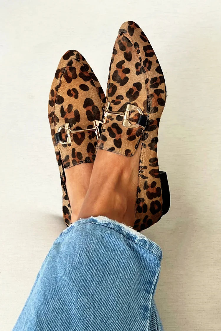 Elegant women's slip-on loafers with chic metallic detail, perfect for office or casual wear. Comfortable & stylish.
