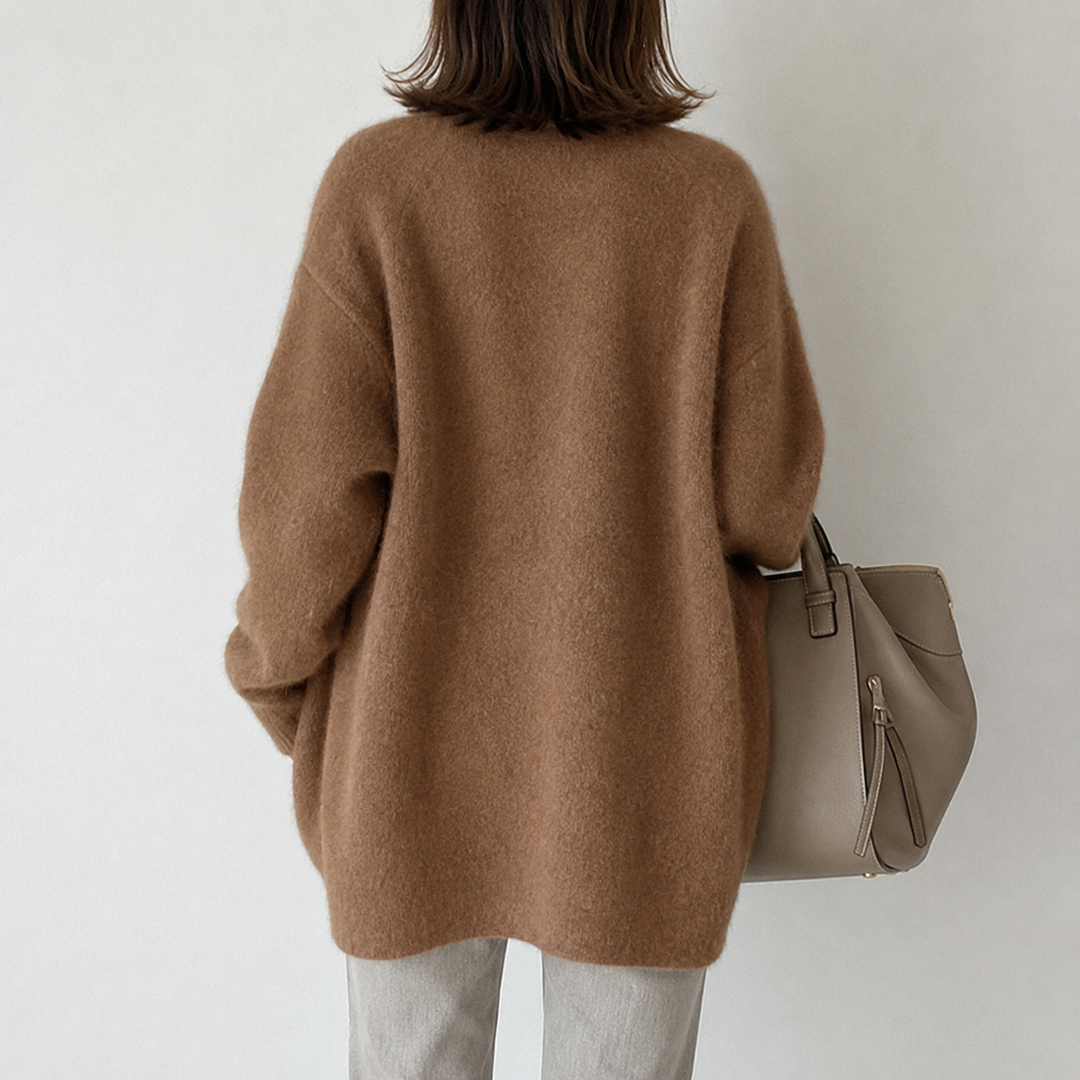 Button-front women's cardigan, mid-length, ideal for versatile layering & everyday elegance.