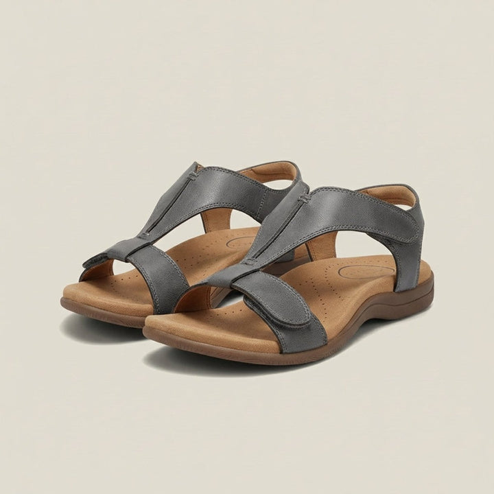 Side view of women's T-strap orthopedic sandals, highlighting cushioned support and open toe.