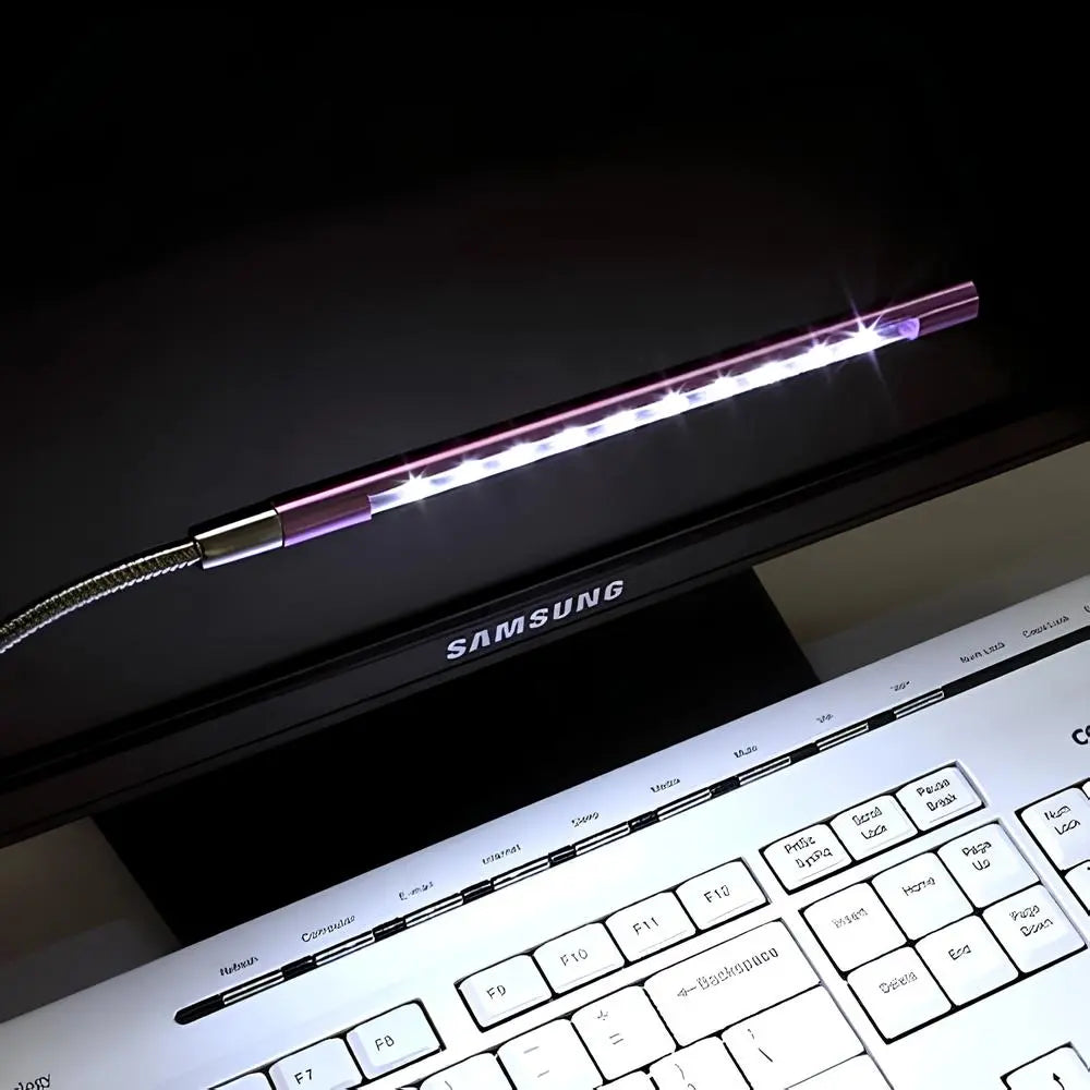 Dimmable USB LED keyboard light with flexible gooseneck for comfortable desk & workstation illumination.
