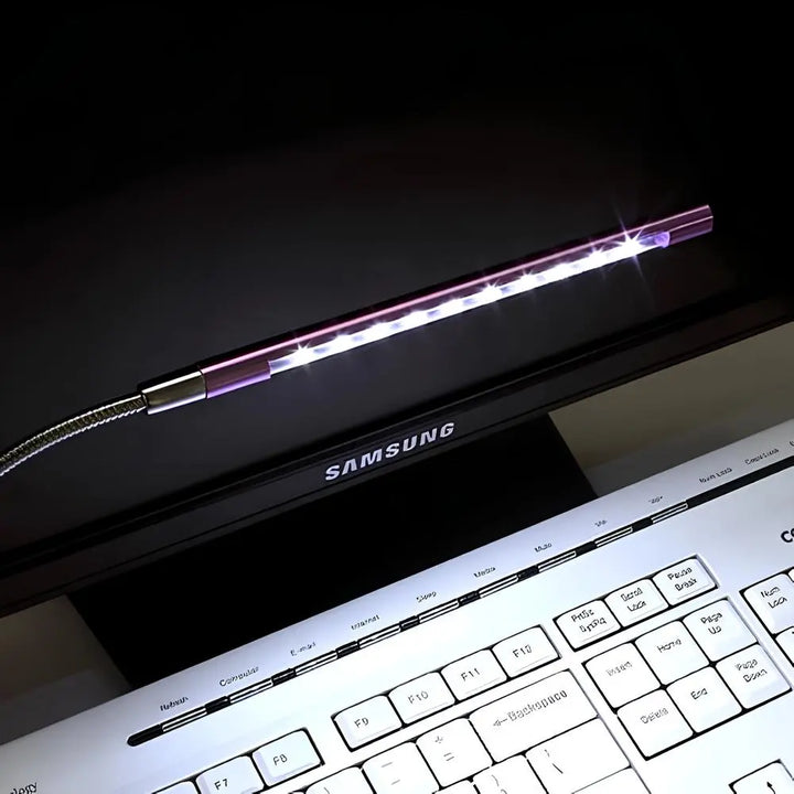 Dimmable USB LED keyboard light with flexible gooseneck for comfortable desk & workstation illumination.