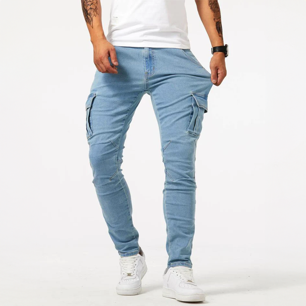 Grey men's stretch denim cargo pants with utility pockets, perfect for casual urban style & comfort.