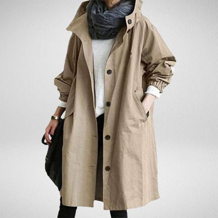Long waterproof raincoat for women, offering full body protection. Stylish hooded jacket, perfect for spring & autumn weather.