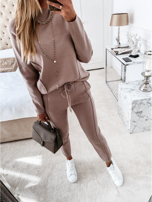 Chic women's 2-piece comfort suit; stylish high collar loungewear set for relaxation and everyday wear.