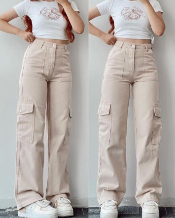 Modern women's denim cargo pants with practical pockets, ideal for a fashionable casual look.