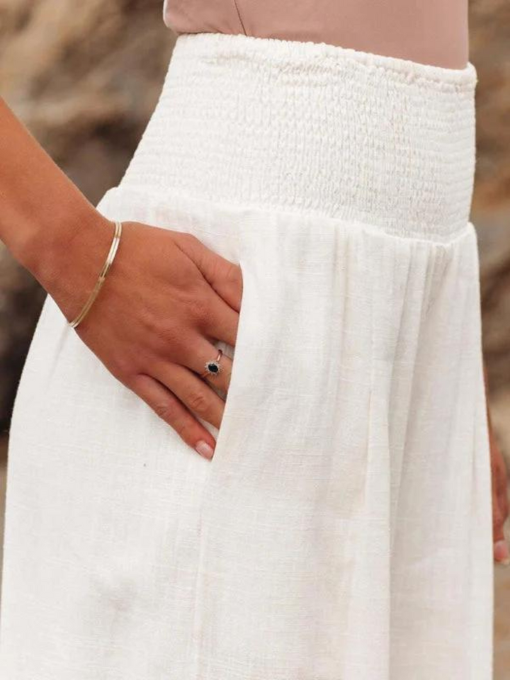 Stylish women's wide leg flowy pants, essential summer fashion for beachwear, holidays, and coastal living.