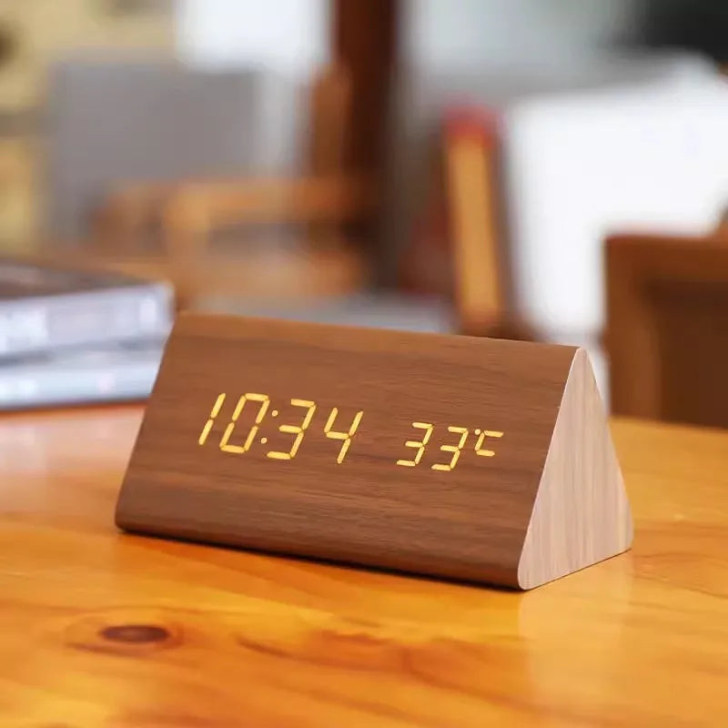 Minimalist smart clock with clear LED display & hands-free voice control feature.