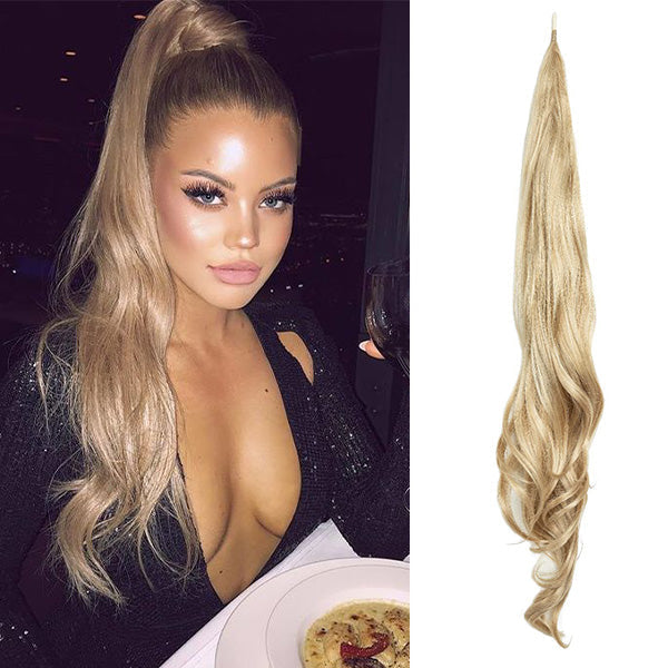 Voluminous clip-in ponytail extension for women, instantly adds long, full hair. Easy style beauty accessory.