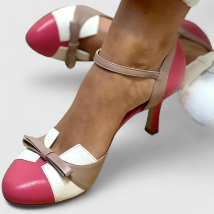 Elegant women's pink orthopedic high heels, designed for comfort & posture support. Stylish footwear for foot pain relief.