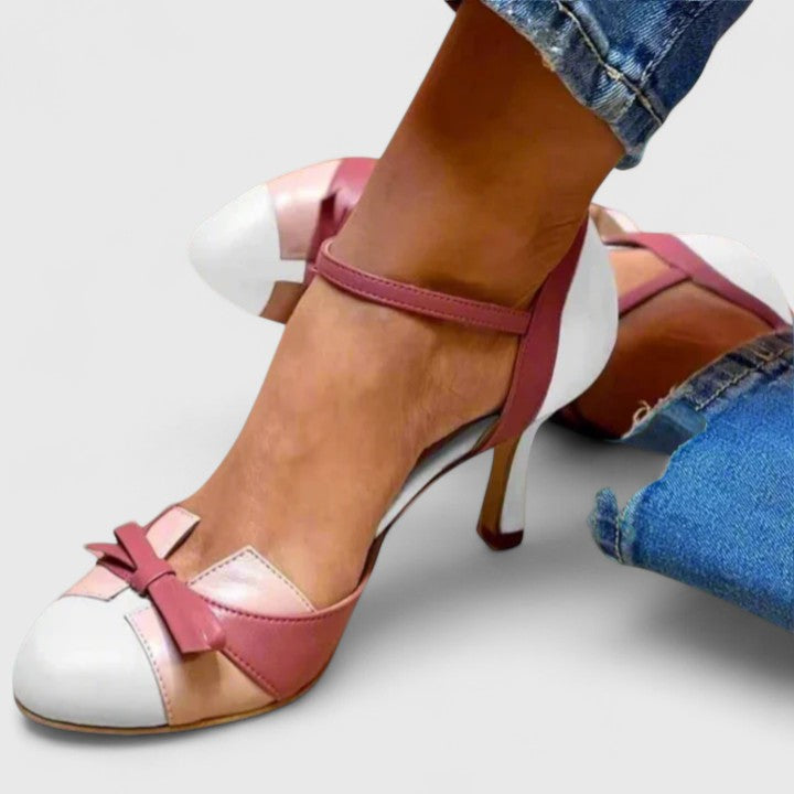 Stylish women's pink high heels with orthopedic comfort. Elegant footwear offering posture support & foot pain relief.