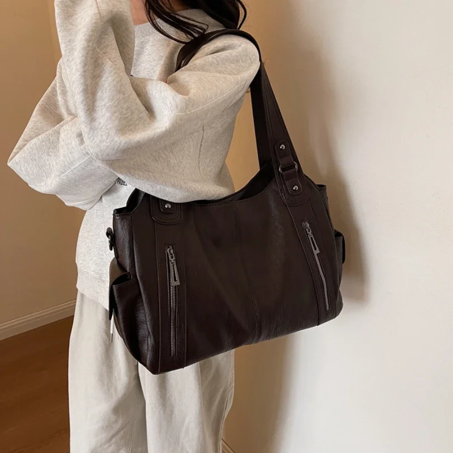 Stylish vegan leather women's shoulder duffle, perfect everyday handbag, travel accessory, or work bag.