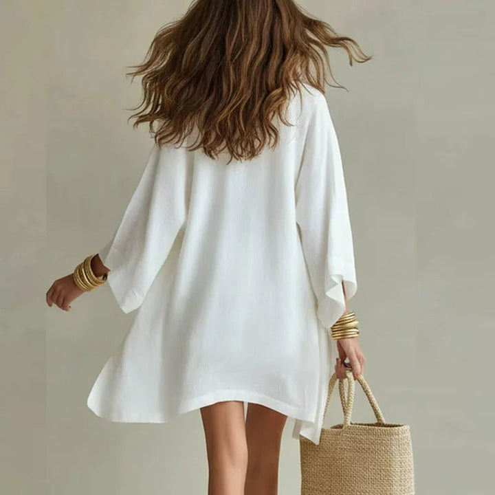 Effortless women's linen loungewear set. Chic 3-piece includes a top, shorts, & kimono. Versatile summer outfit.