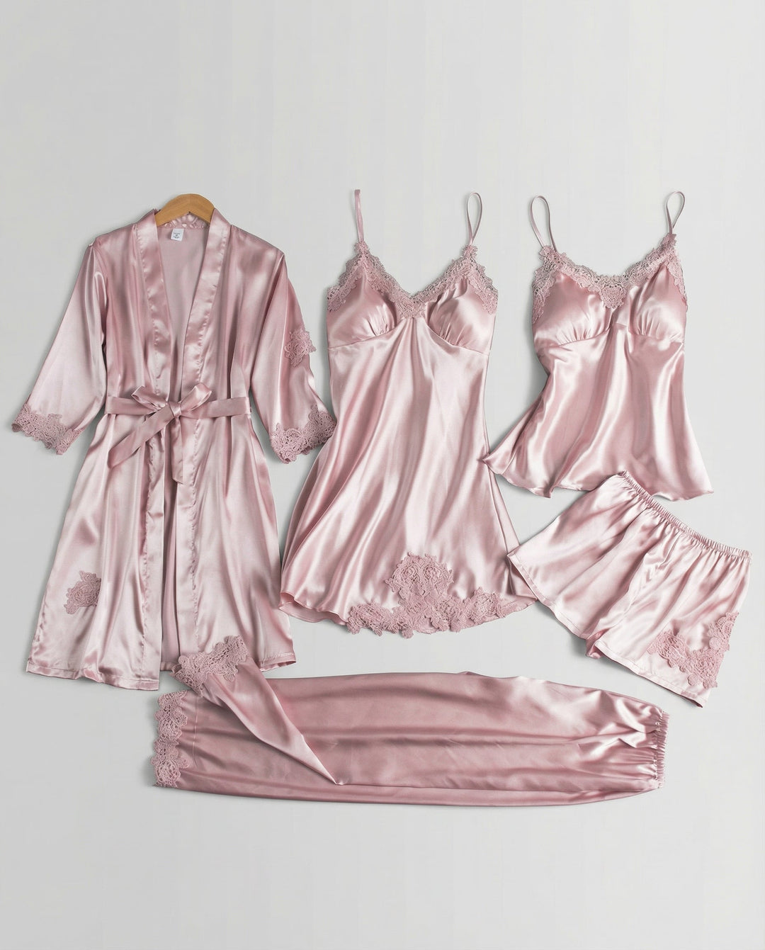 Chic women's silk pajama set with an elegant design, perfect for luxurious lounging and sleeping.