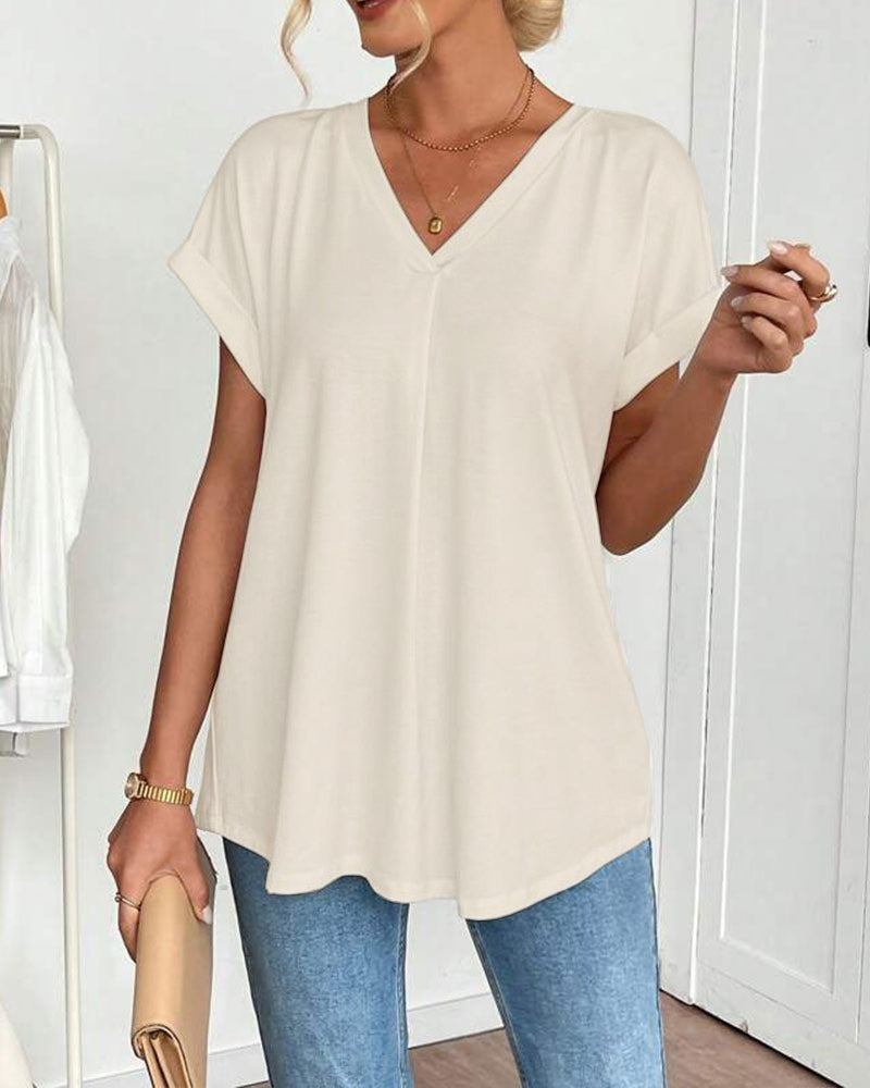 Fashionable women's V-neck shirt, providing a flattering slimming fit for effortless style.