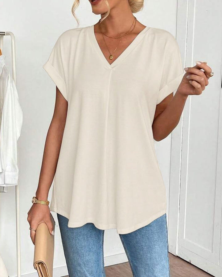 Fashionable women's V-neck shirt, providing a flattering slimming fit for effortless style.