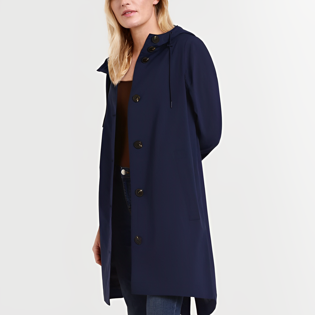 Packable women's waterproof hooded travel jacket, ideal for light rain, hiking & outdoor adventures.