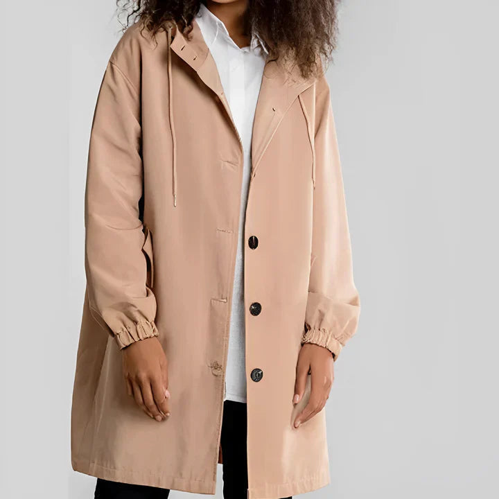 Women's wind-resistant waterproof rain jacket with hood, perfect for hiking, activewear & travel.