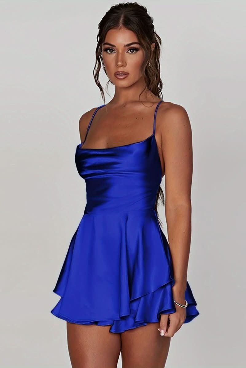 Trendy women's mini cocktail dress with a bold open back and delicate ruched waist detail.