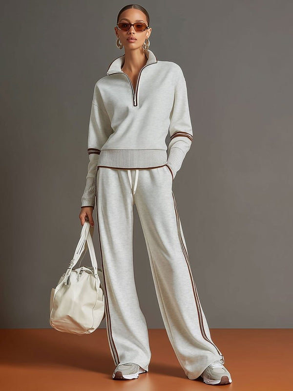 Cozy women's two-piece set: oversized top & wide-leg flowing pants. Perfect for casual everyday comfort.
