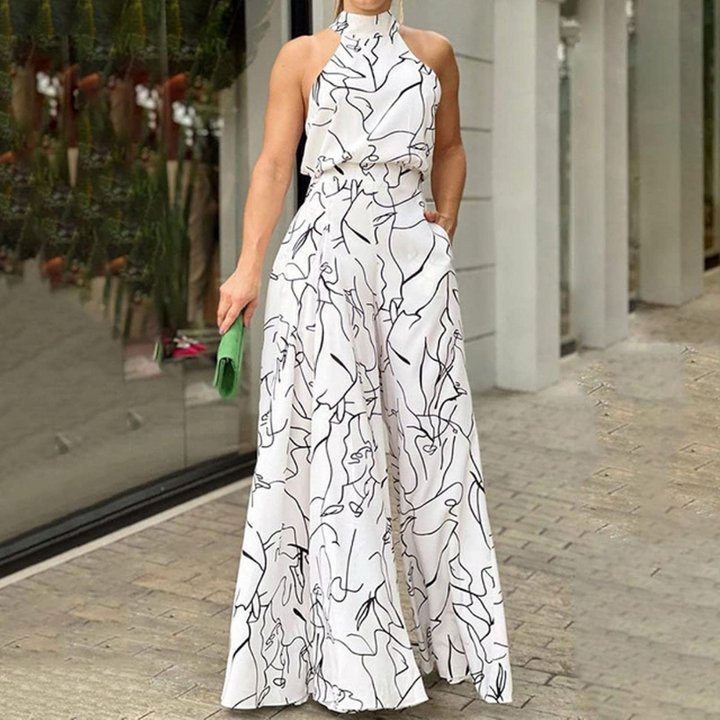 Women's sleeveless belted wide-leg jumpsuit, perfect for elegant summer fashion & versatile evening wear.