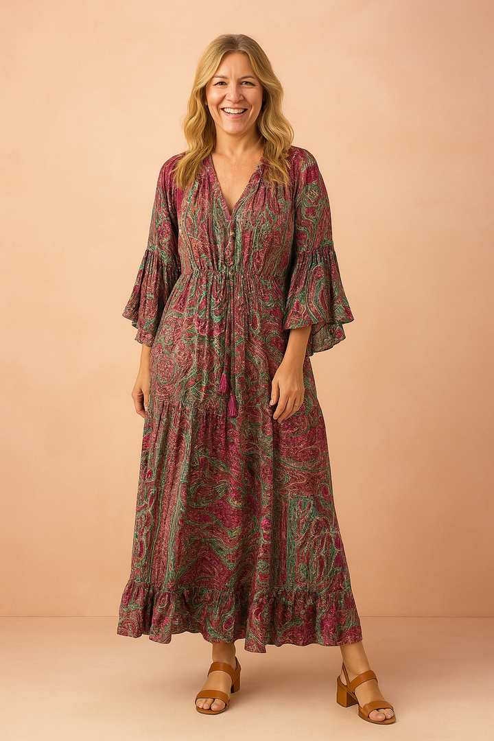 Women's flowy boho maxi dress with elegant long sleeves, perfect for bohemian style and summer casual wear.