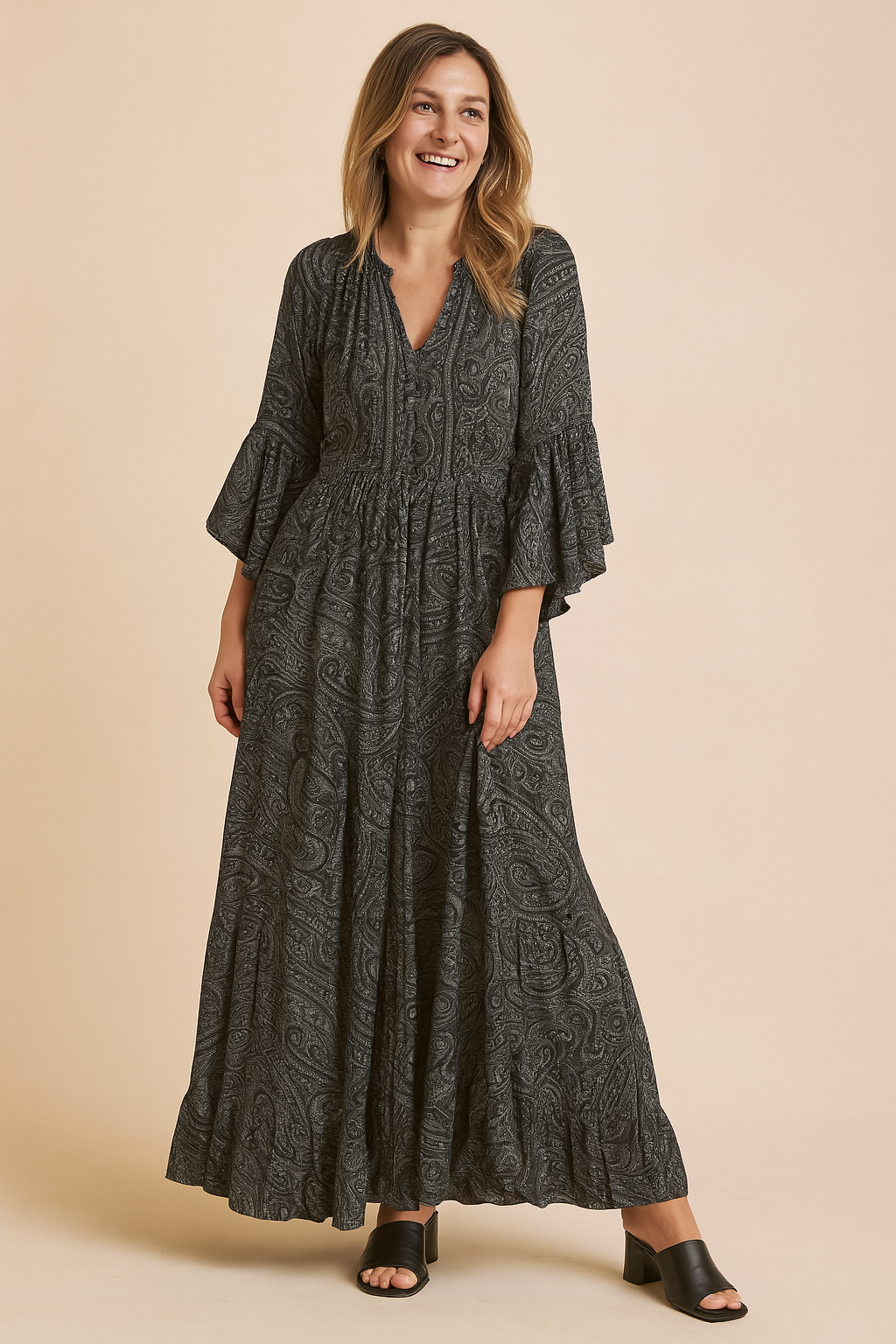 Stylish women's flowy maxi dress, a bohemian dream with long sleeves and a relaxed, casual summer vibe.