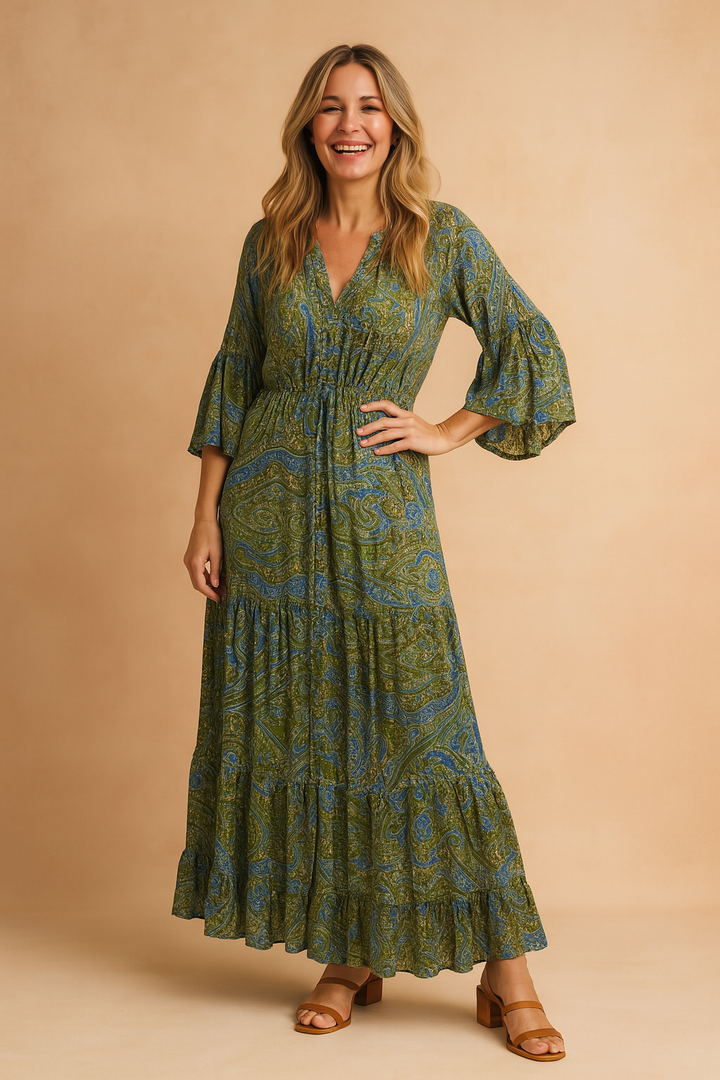 Women's elegant paisley boho maxi dress with long flared sleeves, a flattering V-neck, and flowy tiered skirt.