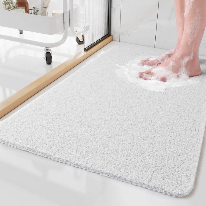Safe & hygienic non-slip shower mat, easy to clean, provides superior grip for worry-free bathing in any shower.