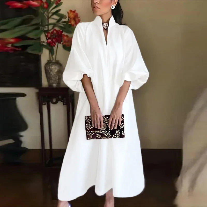 Elegant women's high neck maxi dress. Flowy sleeveless design, perfect for summer casual or party wear. Chic & comfortable.