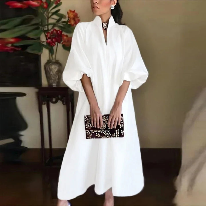 Elegant women's high neck maxi dress. Flowy sleeveless design, perfect for summer casual or party wear. Chic & comfortable.
