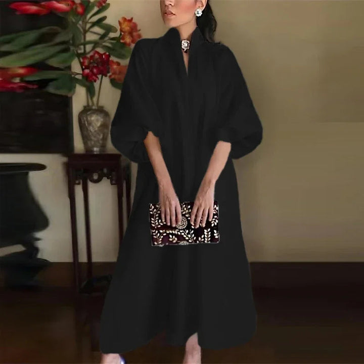 Versatile women's long maxi dress with a chic high neck. Flowing sleeveless design, ideal for elegant casual or party occasions.