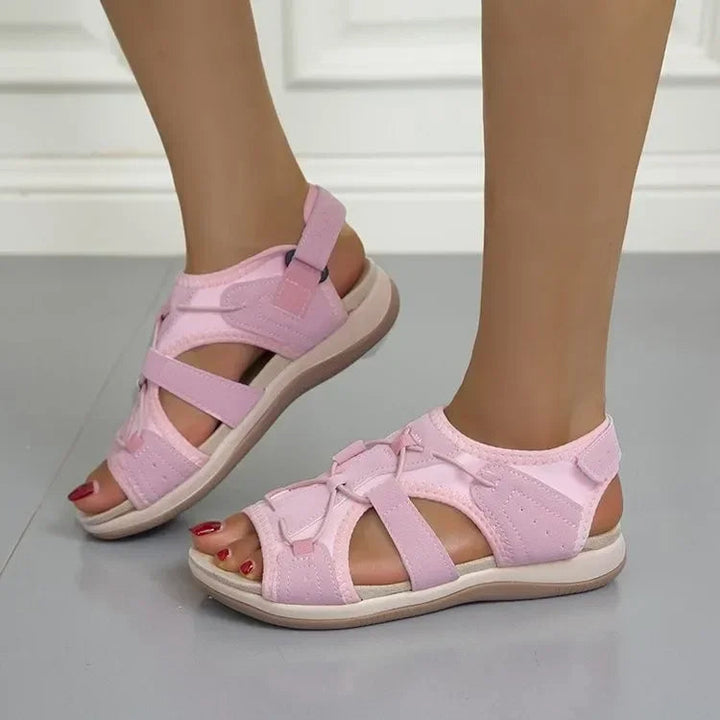 Stylish women's sporty sandals, designed for comfort and support during summer outings.