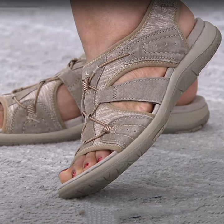 Cushioned women's walking sandals, providing supportive comfort for extended wear.