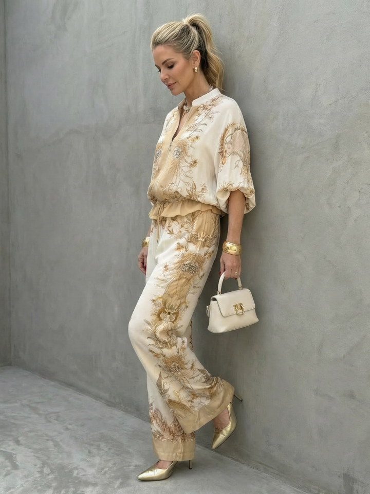 Lightweight women's matching set. Flowy top & wide-leg pants. Perfect for casual comfort or resort wear.
