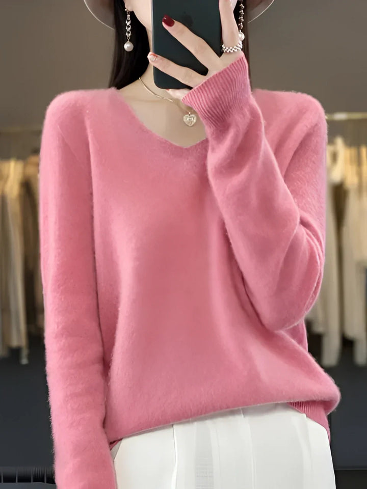 Elegant women's V-neck knit sweater, suitable for sophisticated evening wear or smart casual outfits.