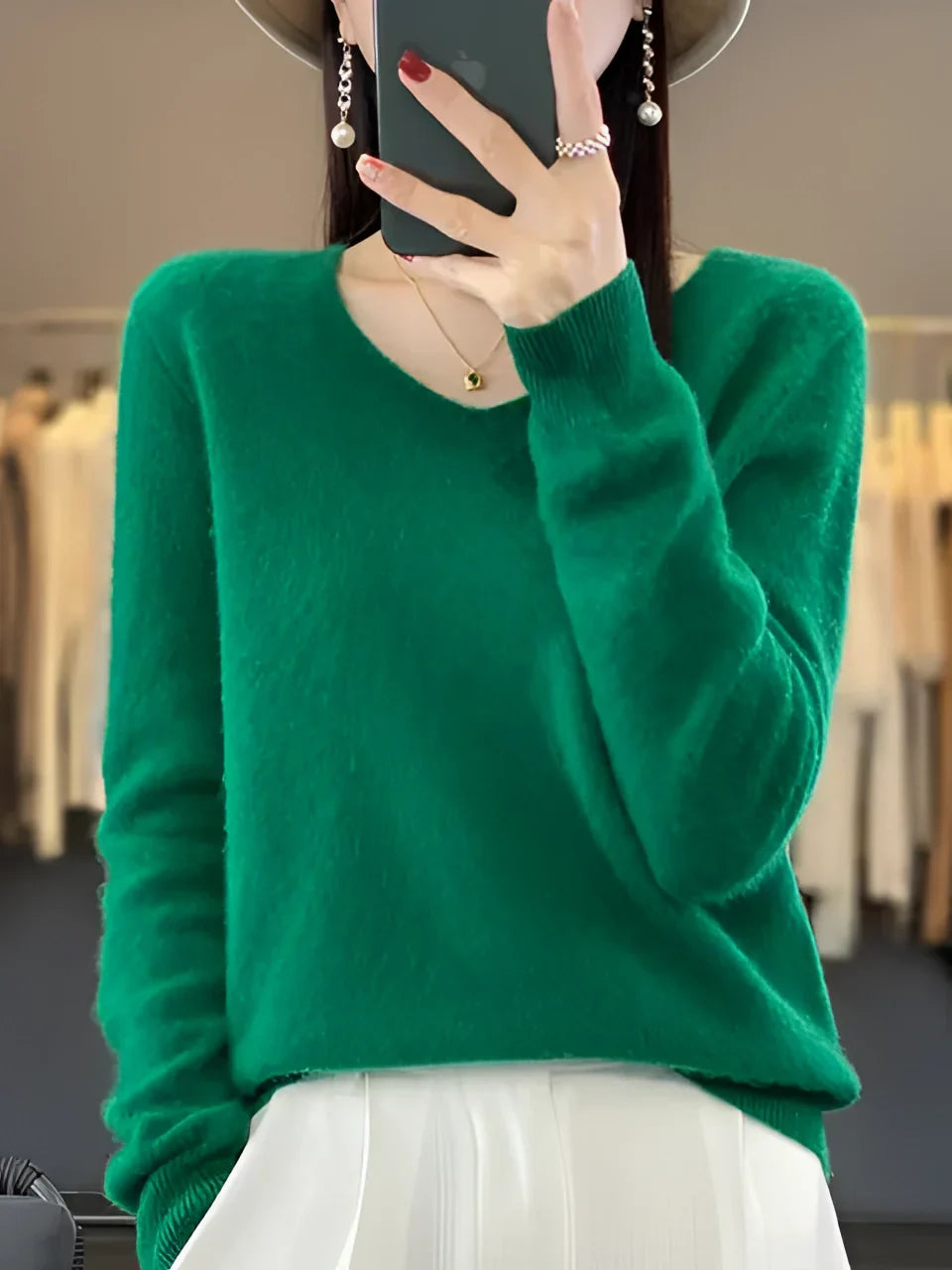 Women's elegant V-neck knit sweater, perfect for cozy fall & winter layering.