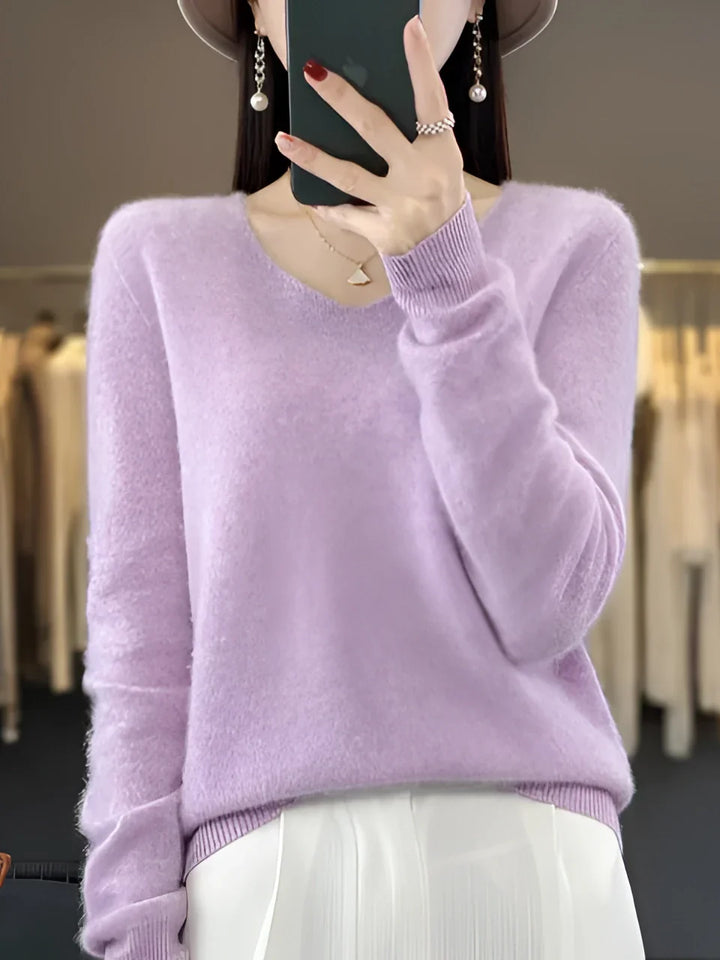 Stylish women's V-neck knit sweater, featuring a classic V-neckline & comfortable long sleeves.