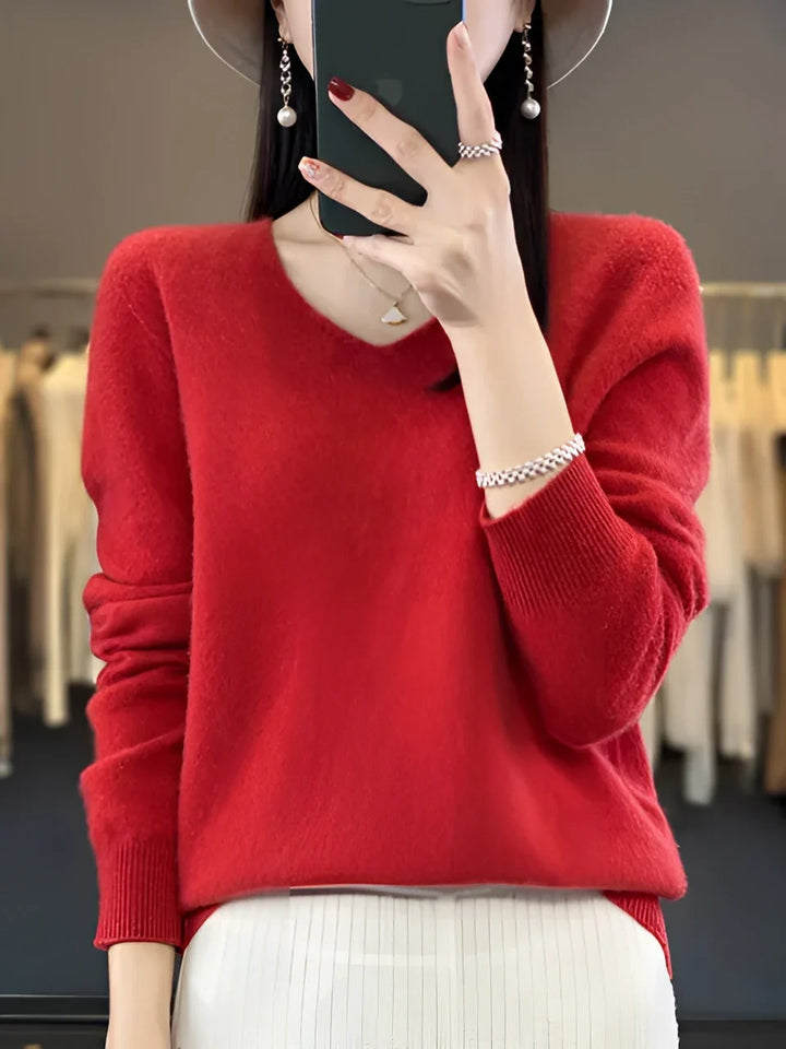 Cozy & elegant women's V-neck knit sweater, a comfortable long-sleeve top for fall, winter, and everyday style.