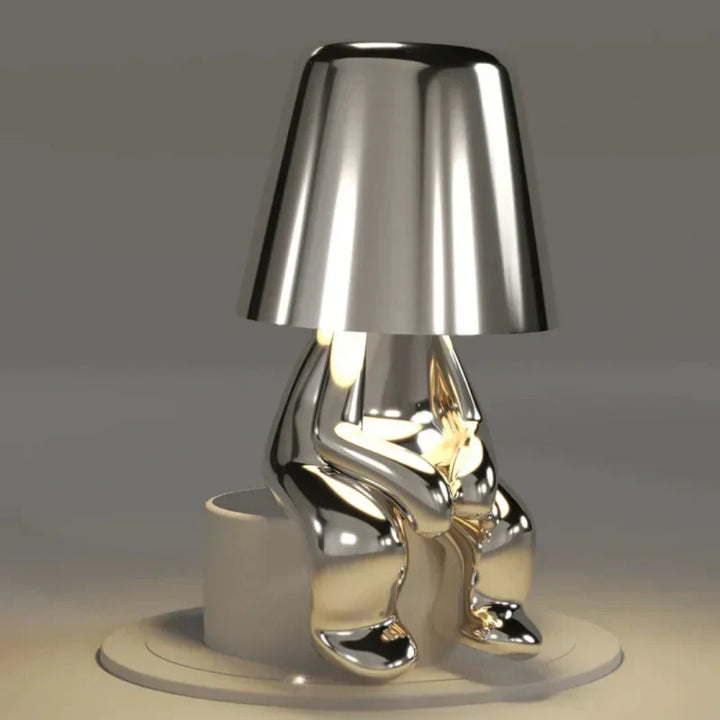 Dimmable LED accent light: Artistic figurine lamp. Cordless, portable, and elegant home decor.