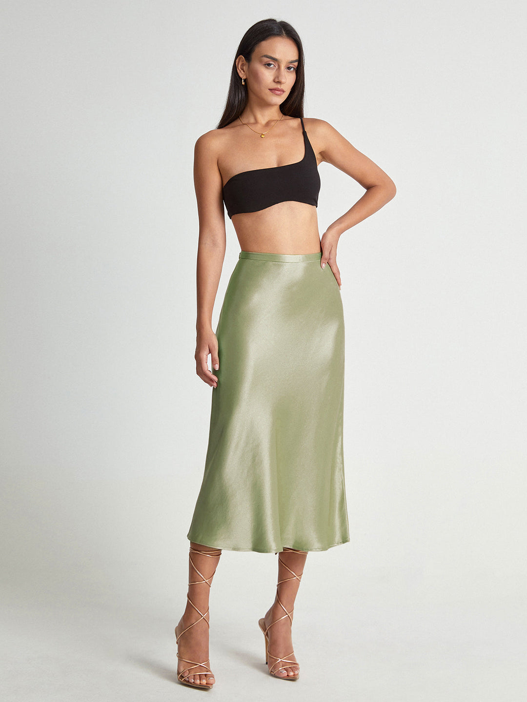 Stylish high-waist flowy midi skirt for women, a versatile piece designed for effortless elegance & modern fashion.