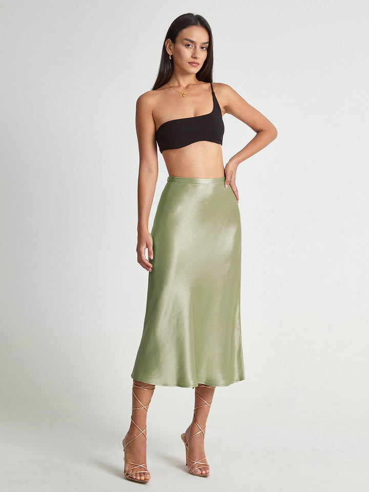 Stylish high-waist flowy midi skirt for women, a versatile piece designed for effortless elegance & modern fashion.