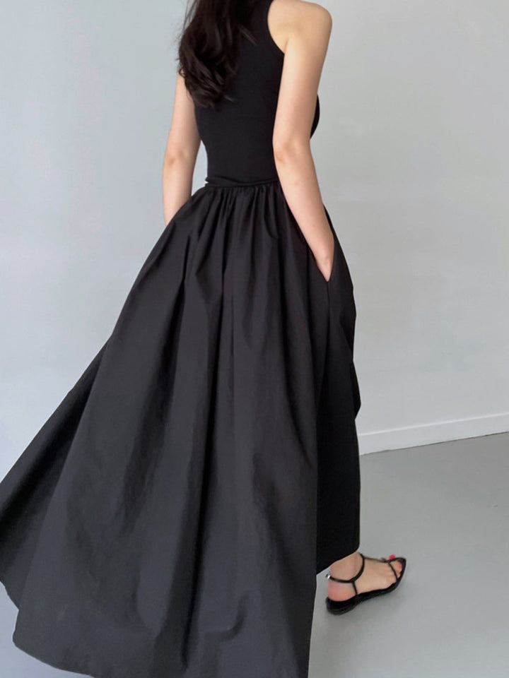 White summer sleeveless maxi dress. Comfortable & versatile for day outings or elegant events.