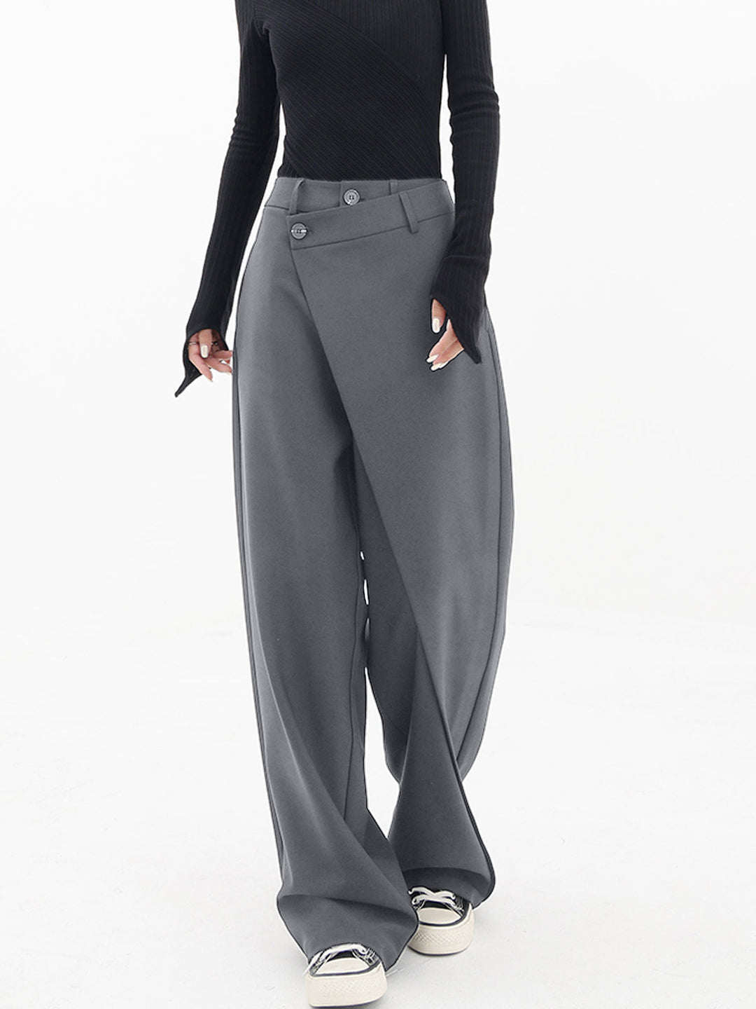 Relaxed fit women's pants with a distinctive asymmetrical cut for modern appeal.