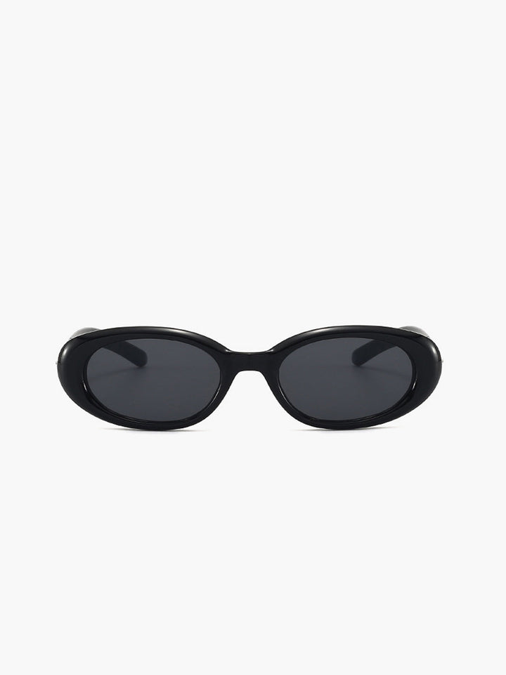 Stylish women's black retro oval sunglasses. Fashionable eyewear offering excellent UV protection.