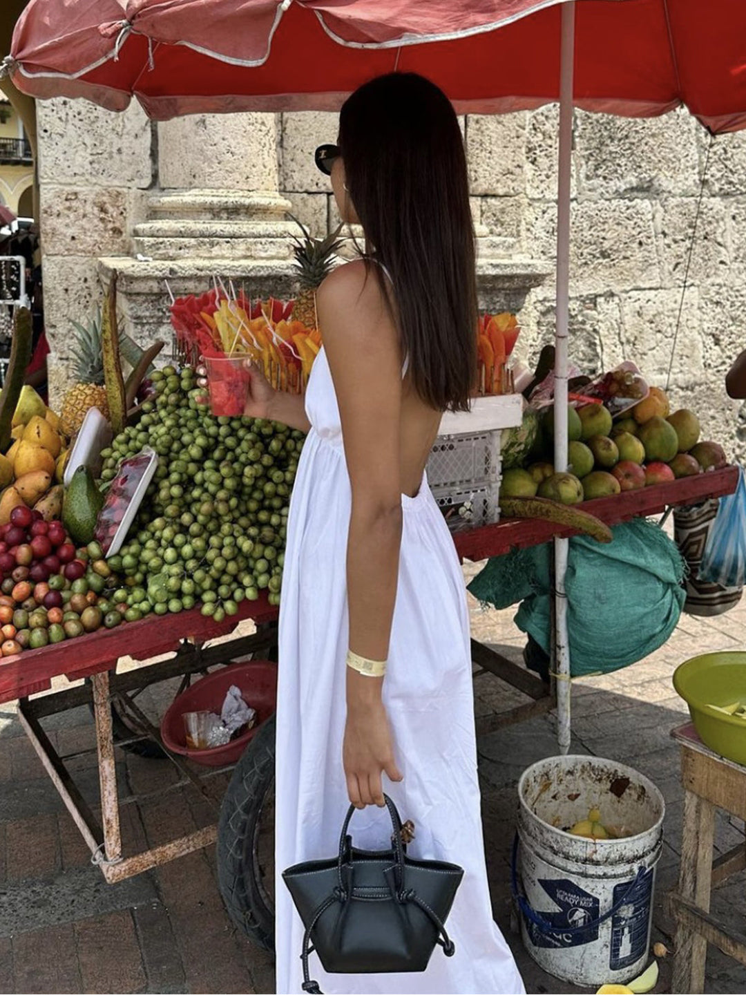 Trendy women's open-back midi dress, v-neck, sleeveless. A perfect summer dress for women's casual fashion.