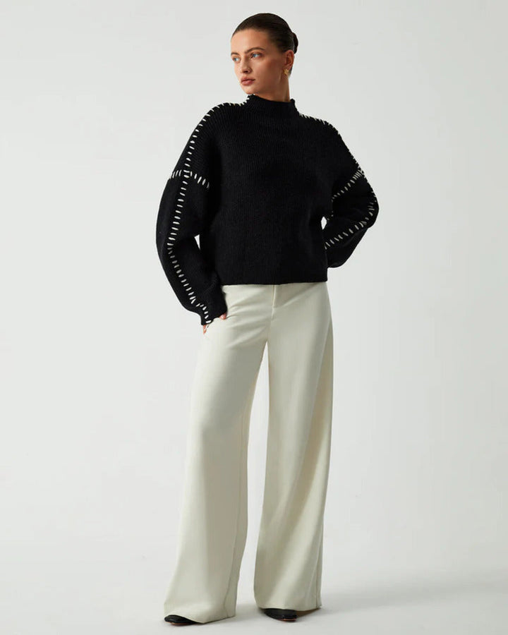 Women's sophisticated black oversized pullover sweater. Perfect cozy long sleeve top for cool weather.
